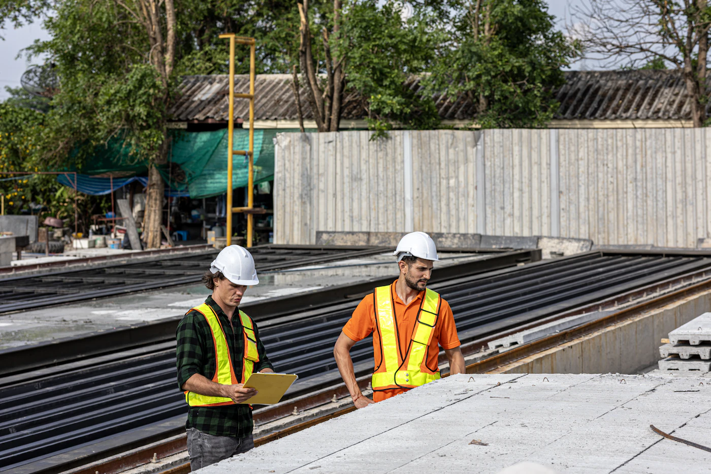 Nexus Engineering team reviewing plans at a job site