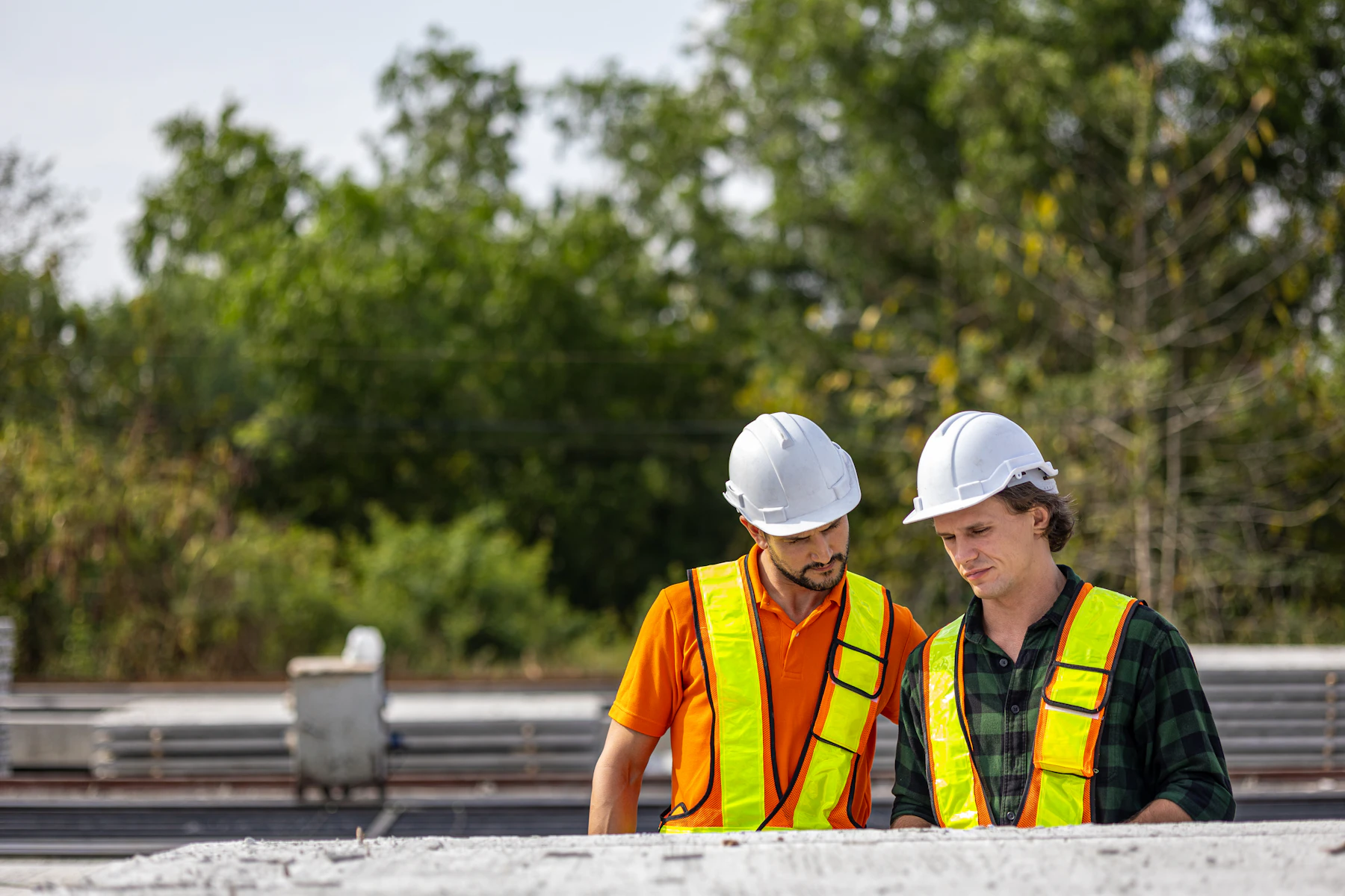 Construction team reviewing near-term work for a two-week look-ahead schedule