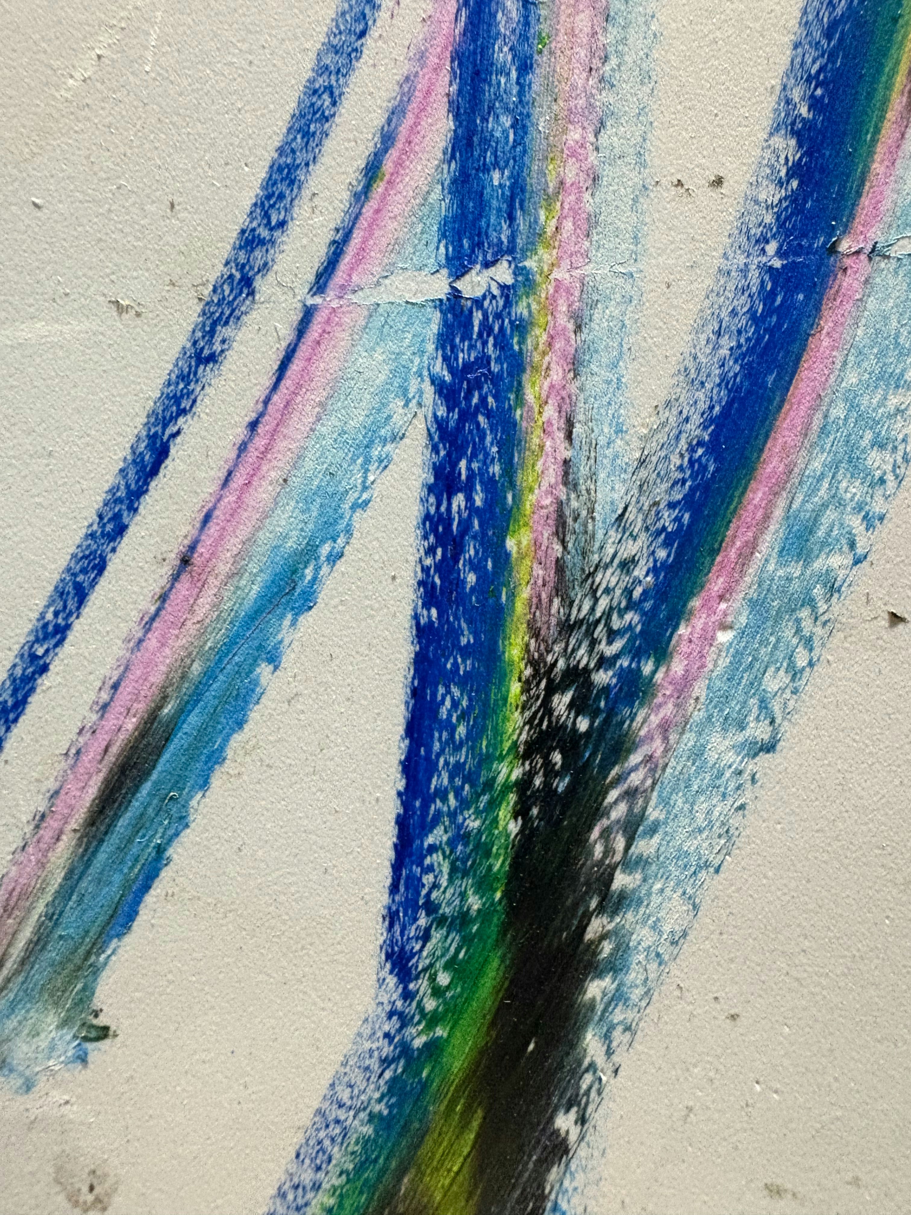 Abstract artwork shows colorful streaks on a wall.
