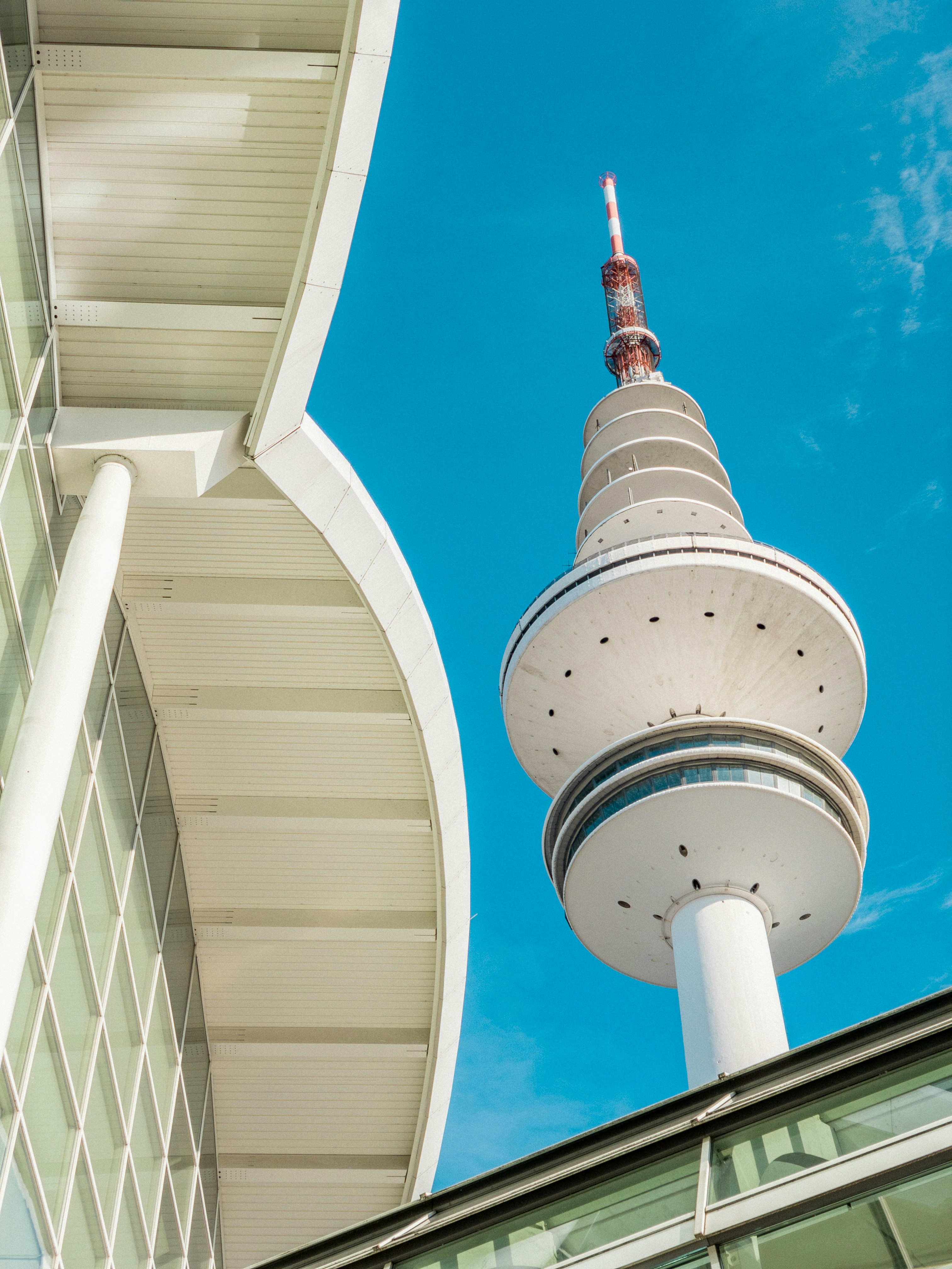A tall white tower reaches high into the sky.