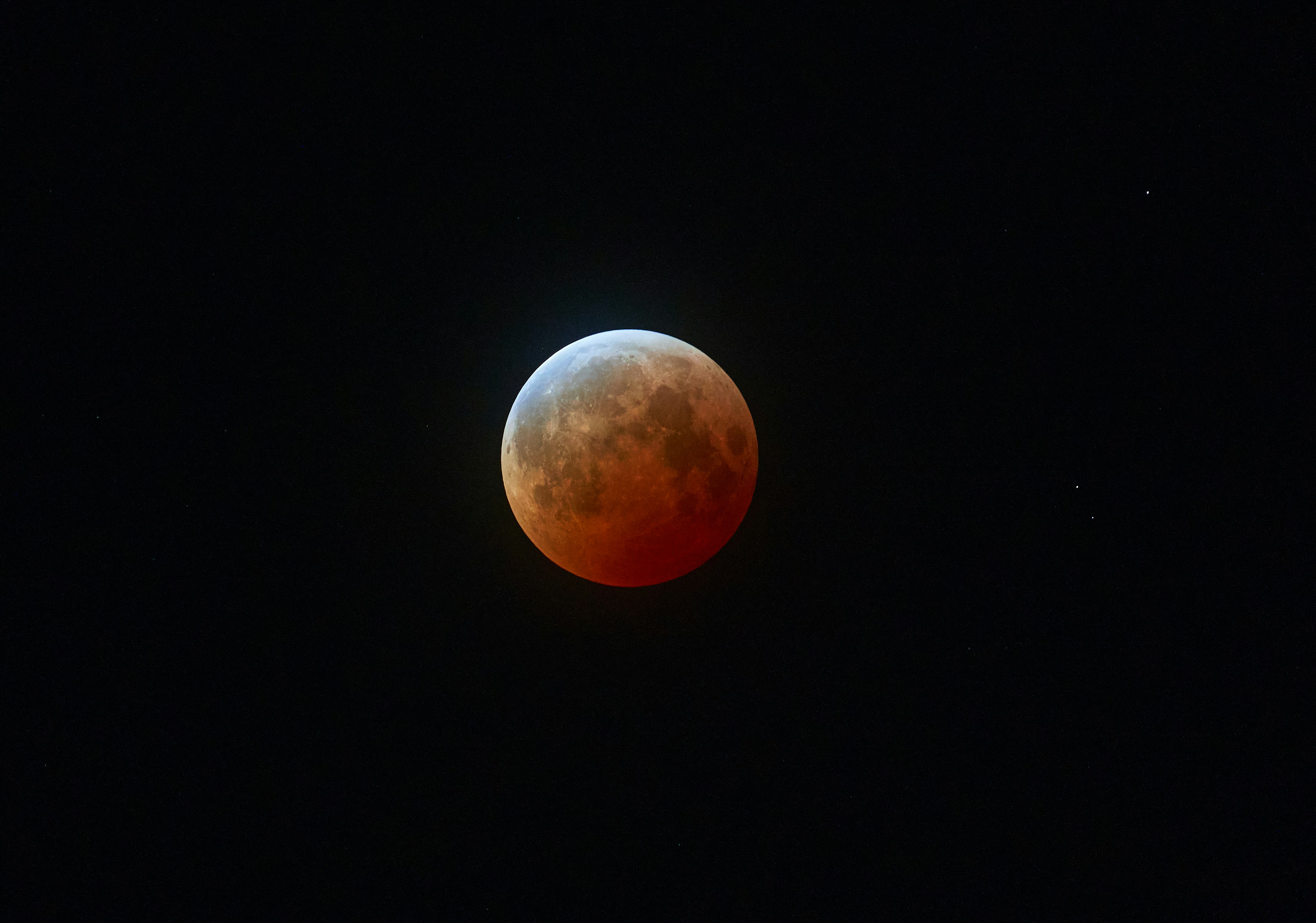 A beautiful blood moon shines brightly.
