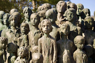 A memorial of bronze statues of children.