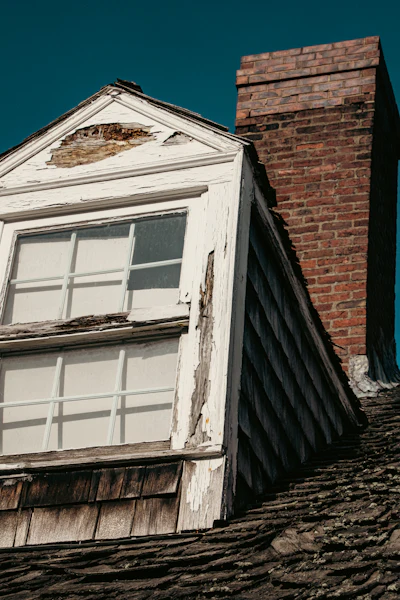 Roof flashing showing wear and damage