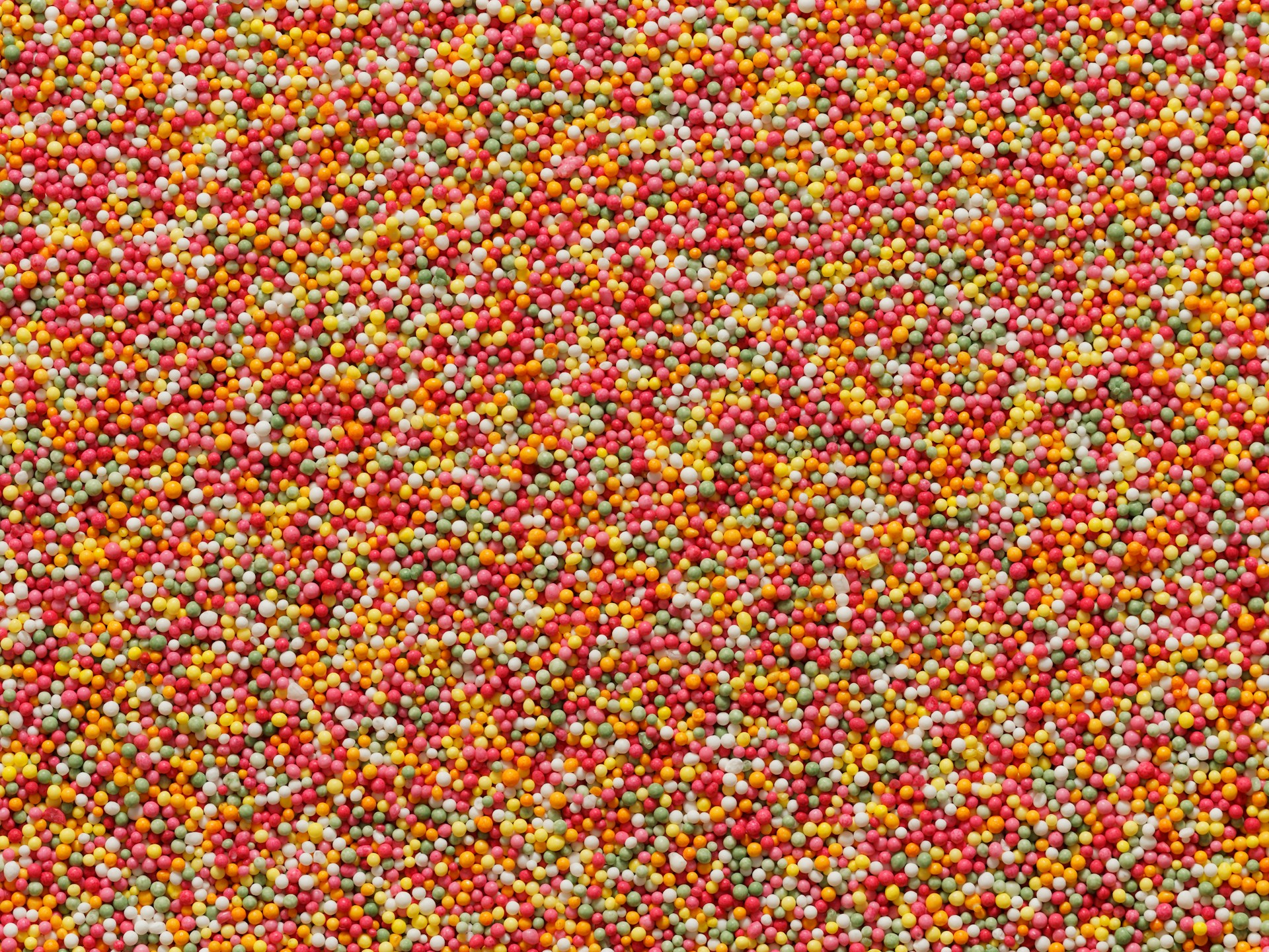 Colorful sprinkles covering the entire frame.