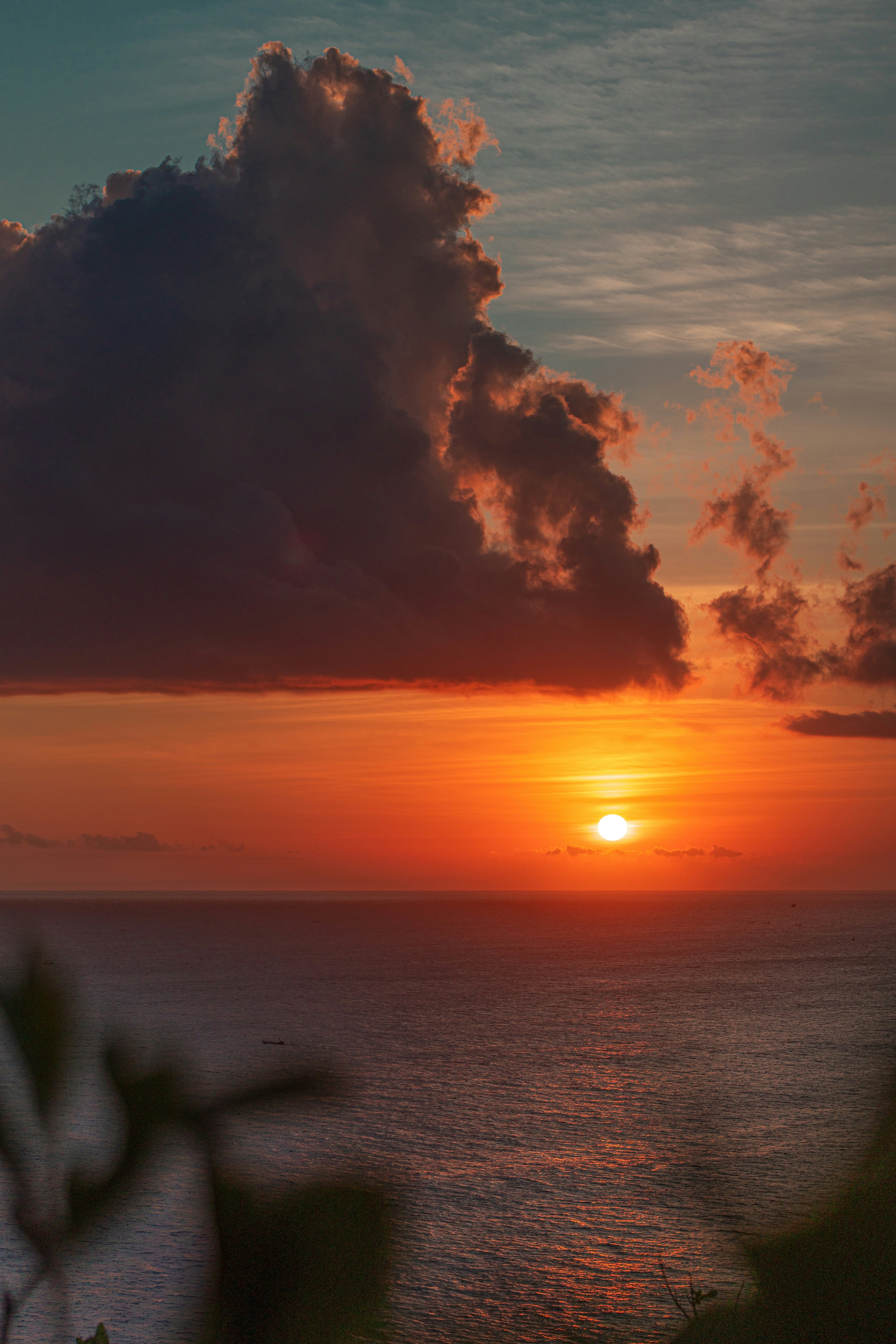 Vibrant sunset over a calm ocean.