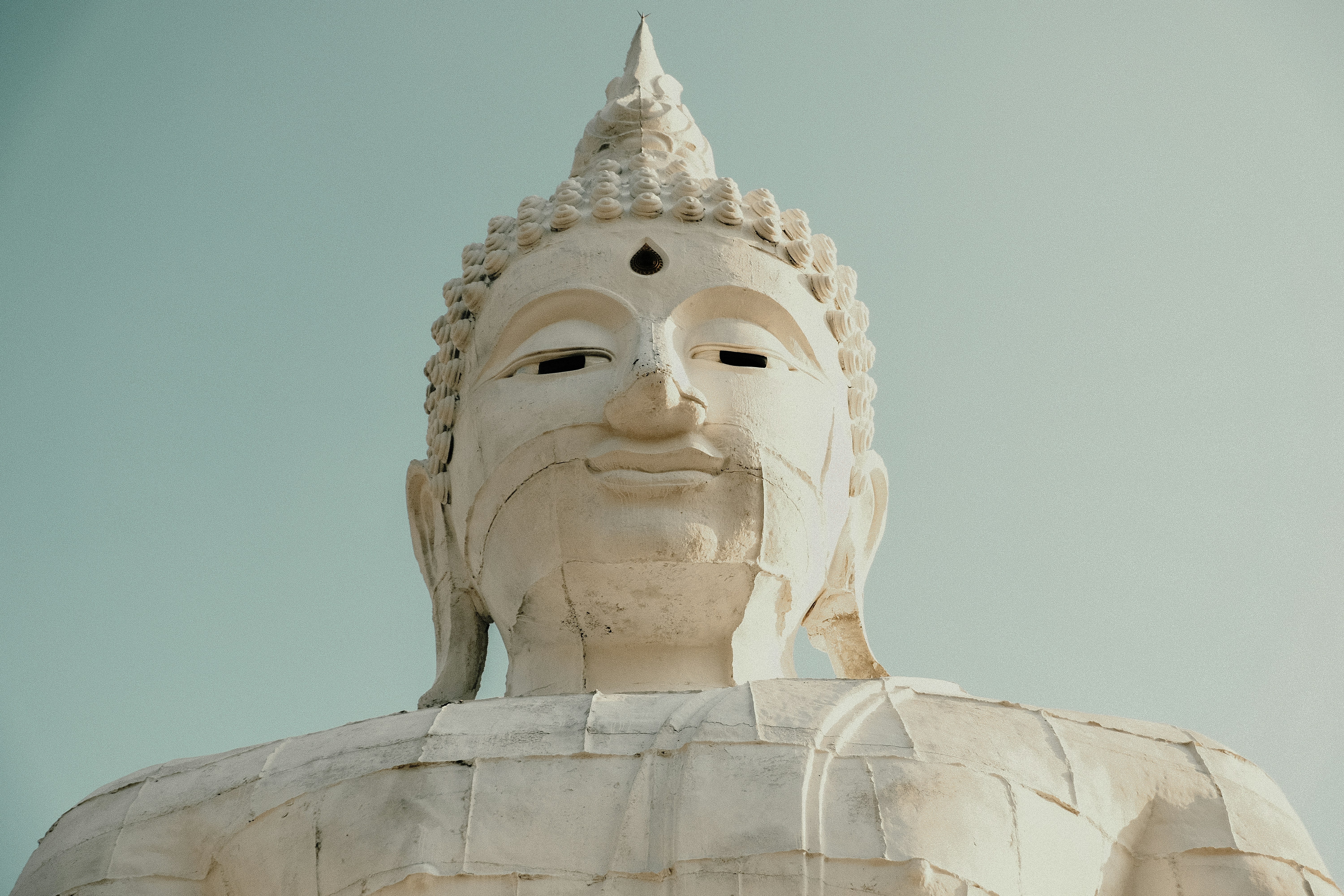 A white statue of buddha., 