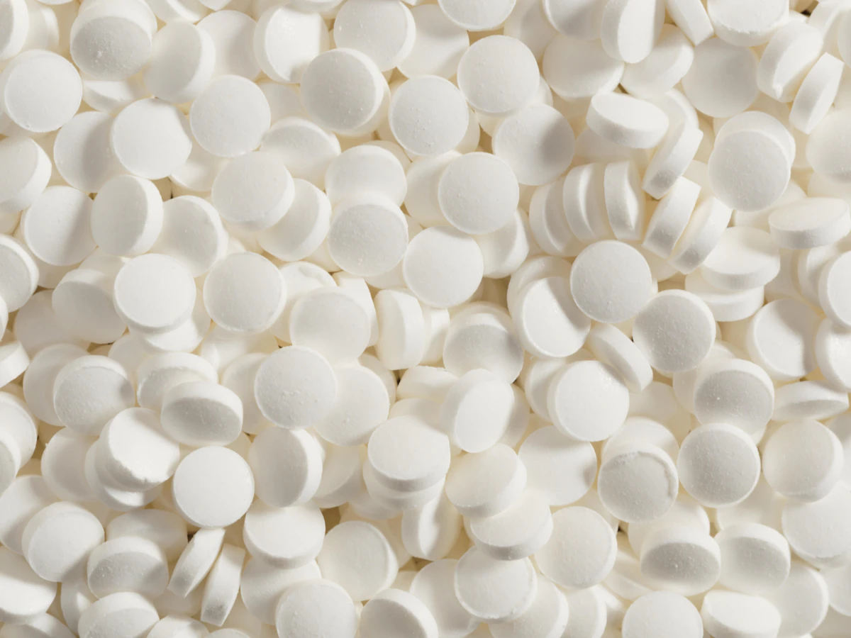 Many white tablets illustrating the importance of clear medication identification