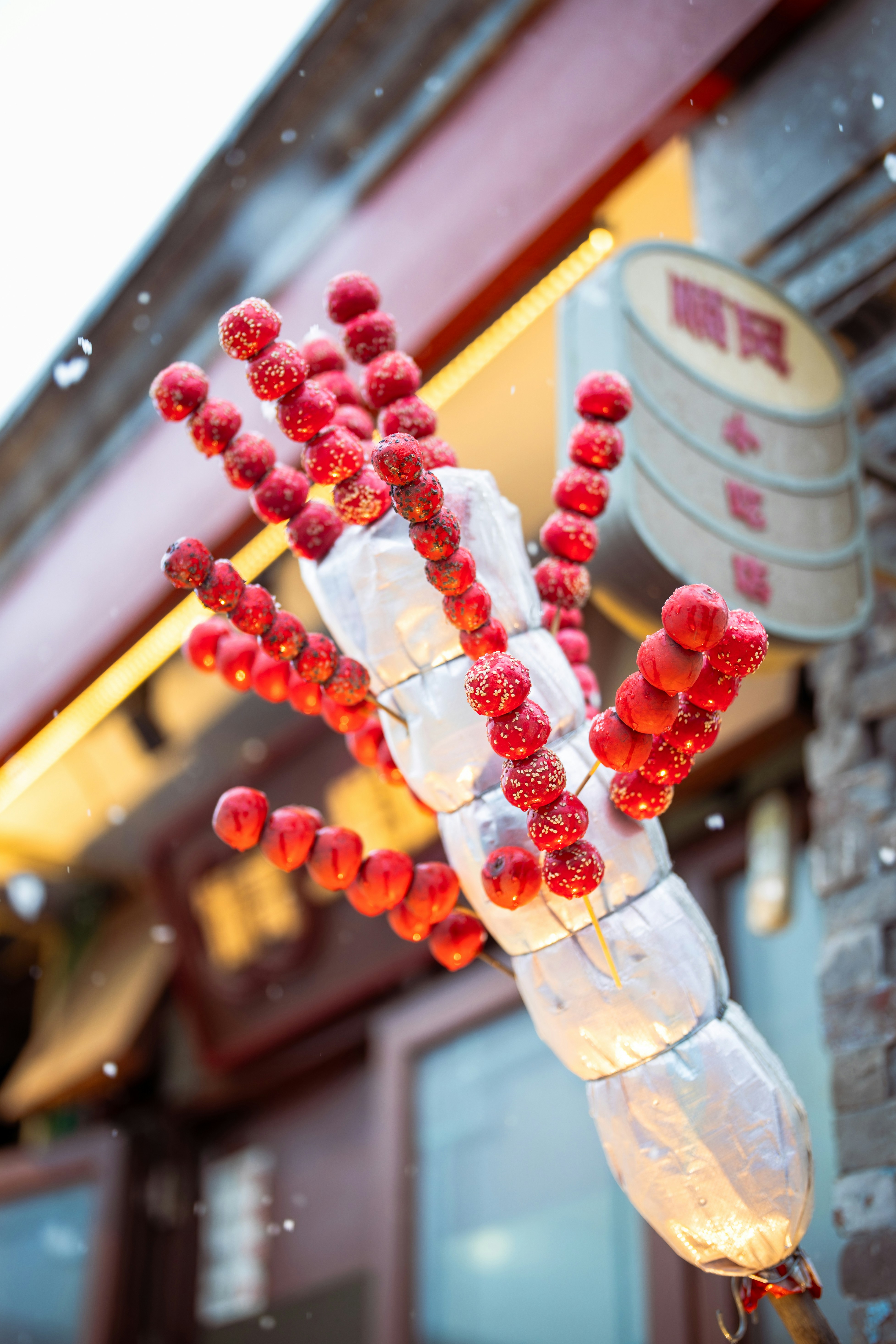 Candied hawthorns on display in a shop.