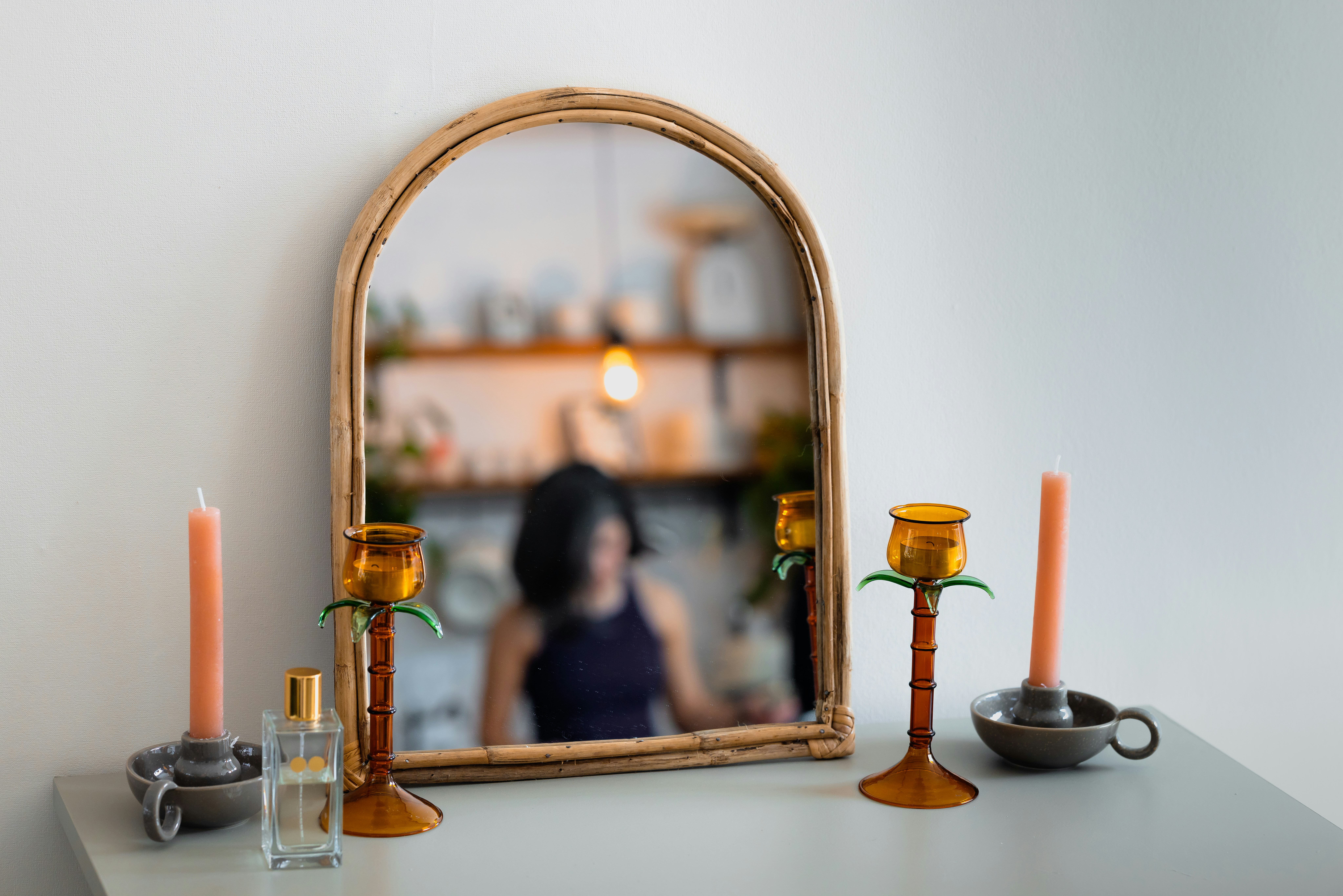 Salon product display with mirror and candles
