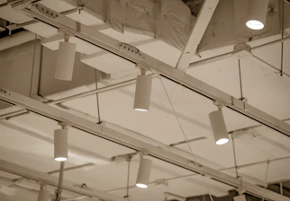 Track lighting fixtures are installed on the ceiling.