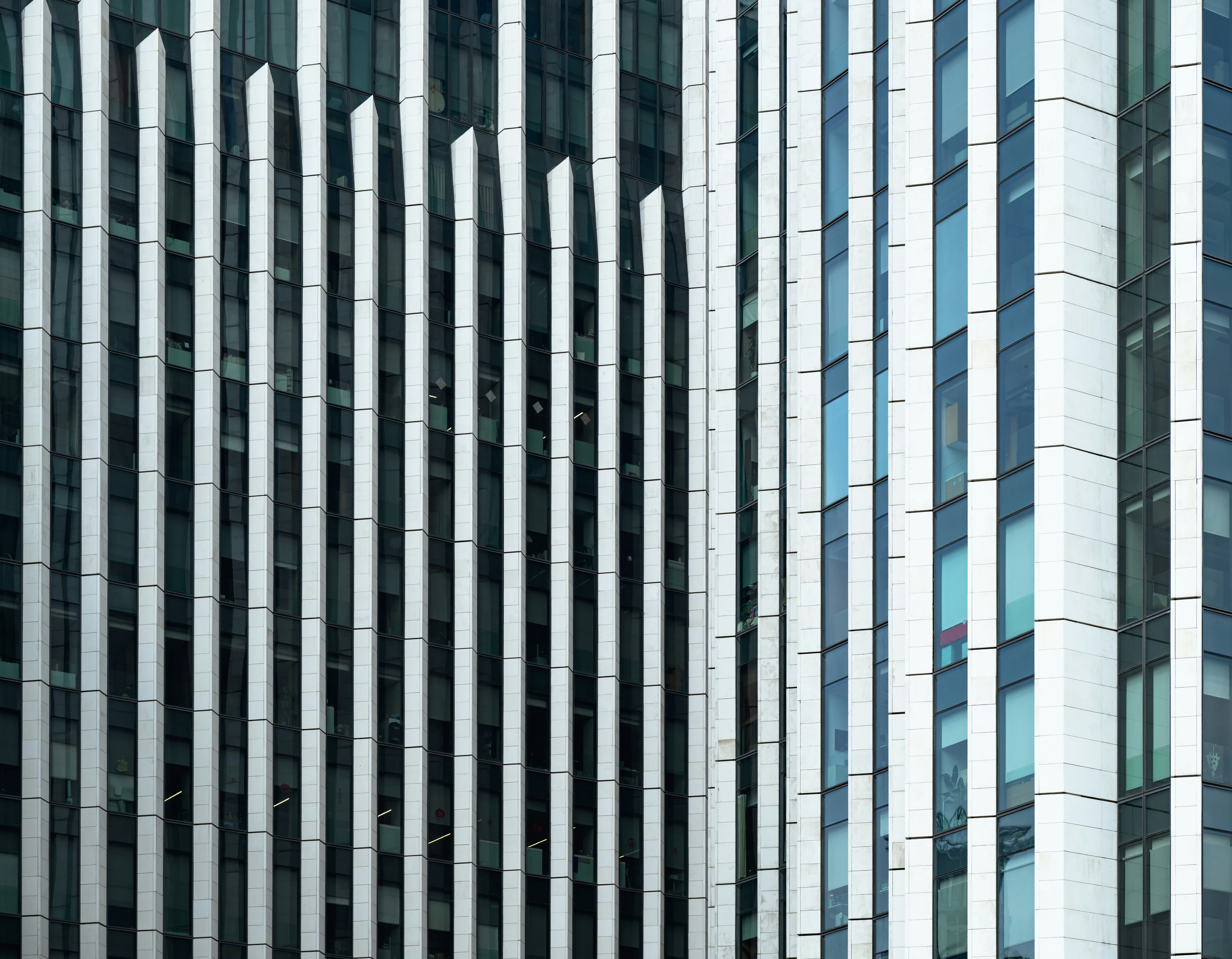 Modern architecture showing vertical white lines.