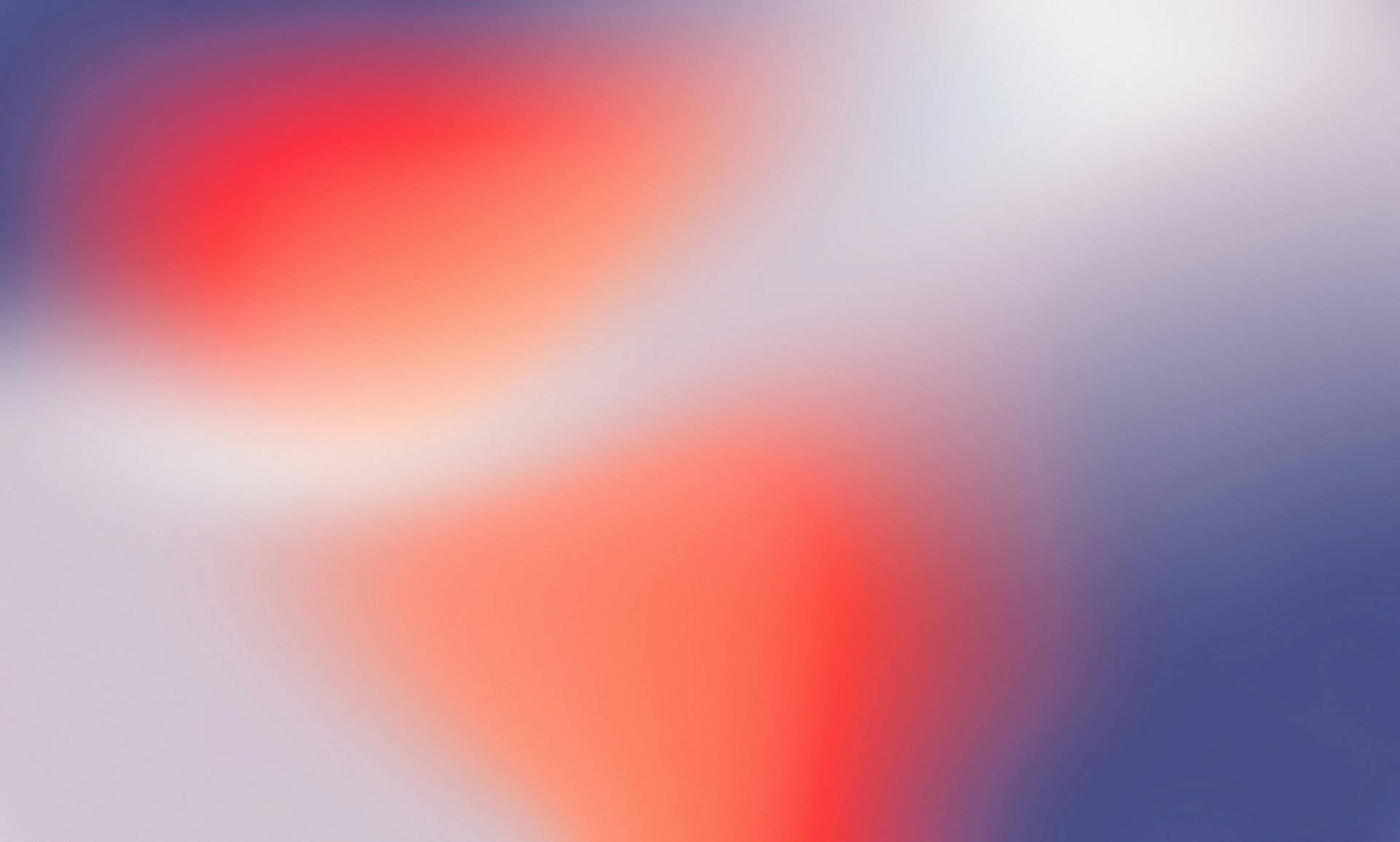 Abstract, colorful gradient background with mixed hues.