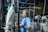 Woman works in a textile manufacturing facility.