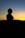 Silhouette of a person at sunset.