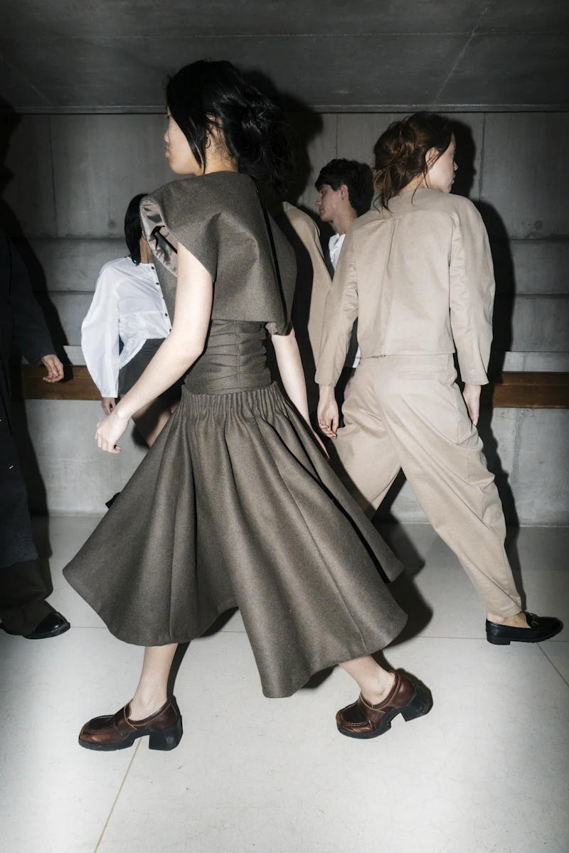Models preparing backstage before a show
