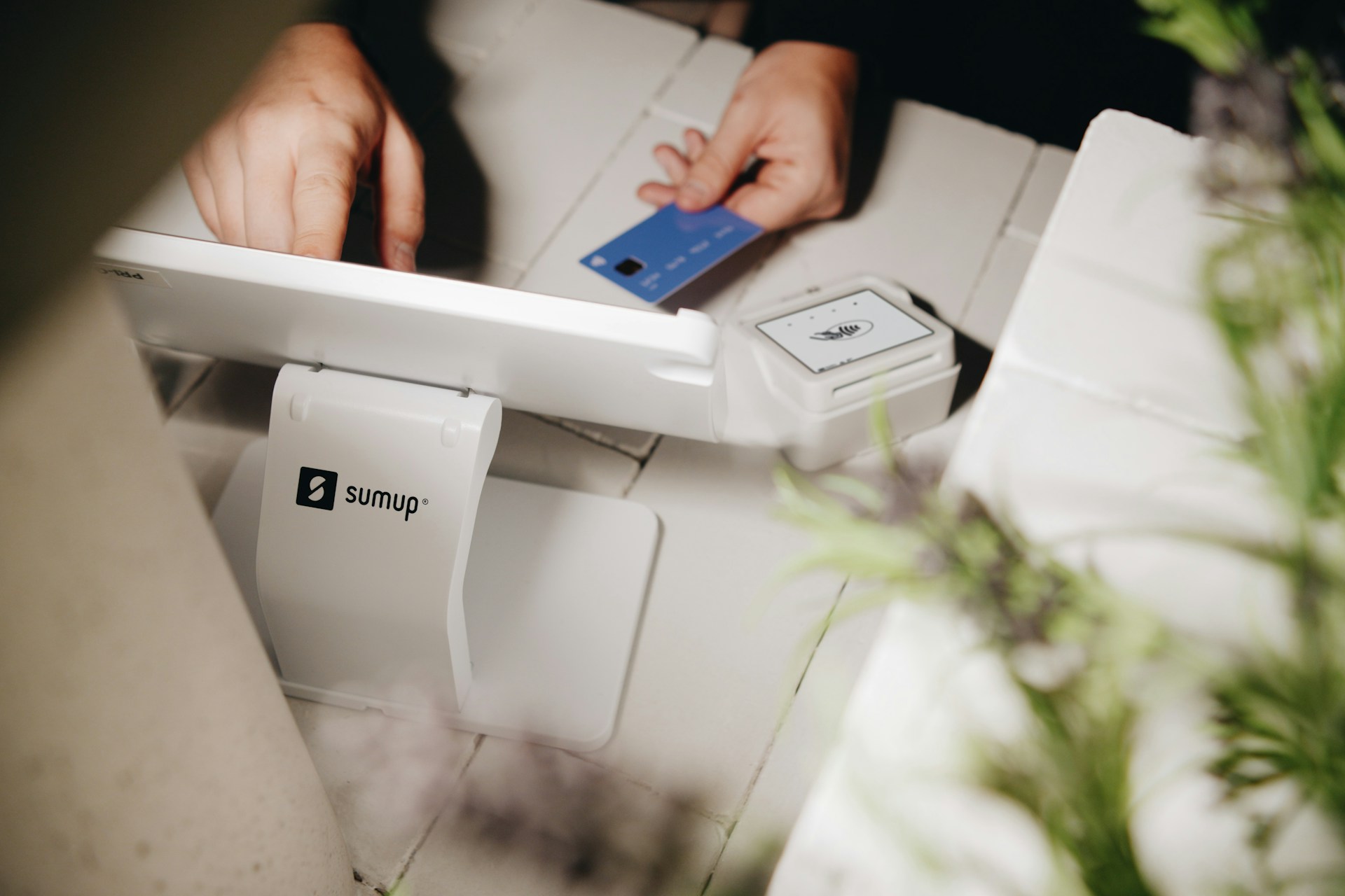 A person is paying with a credit card.