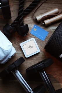 Workout gear with a payment device and card.