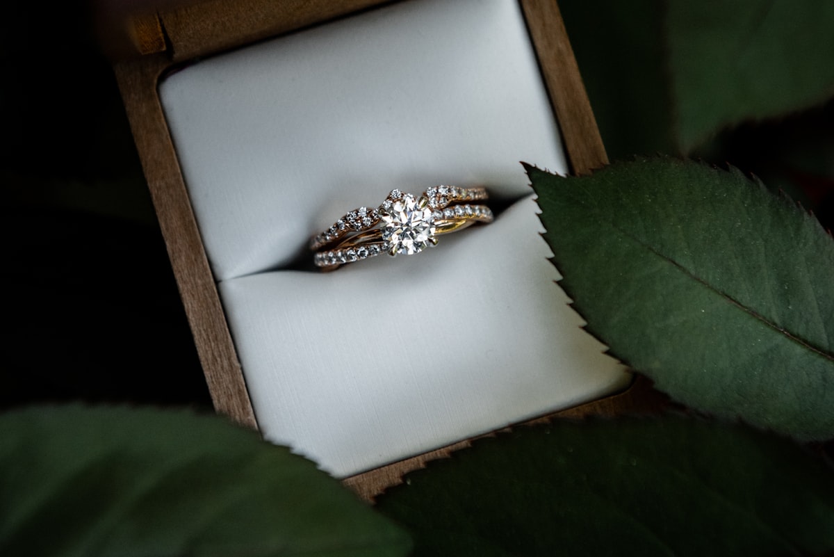 Elegant wedding rings in a box representing symbolic jewelry and meaningful talismans for life transitions