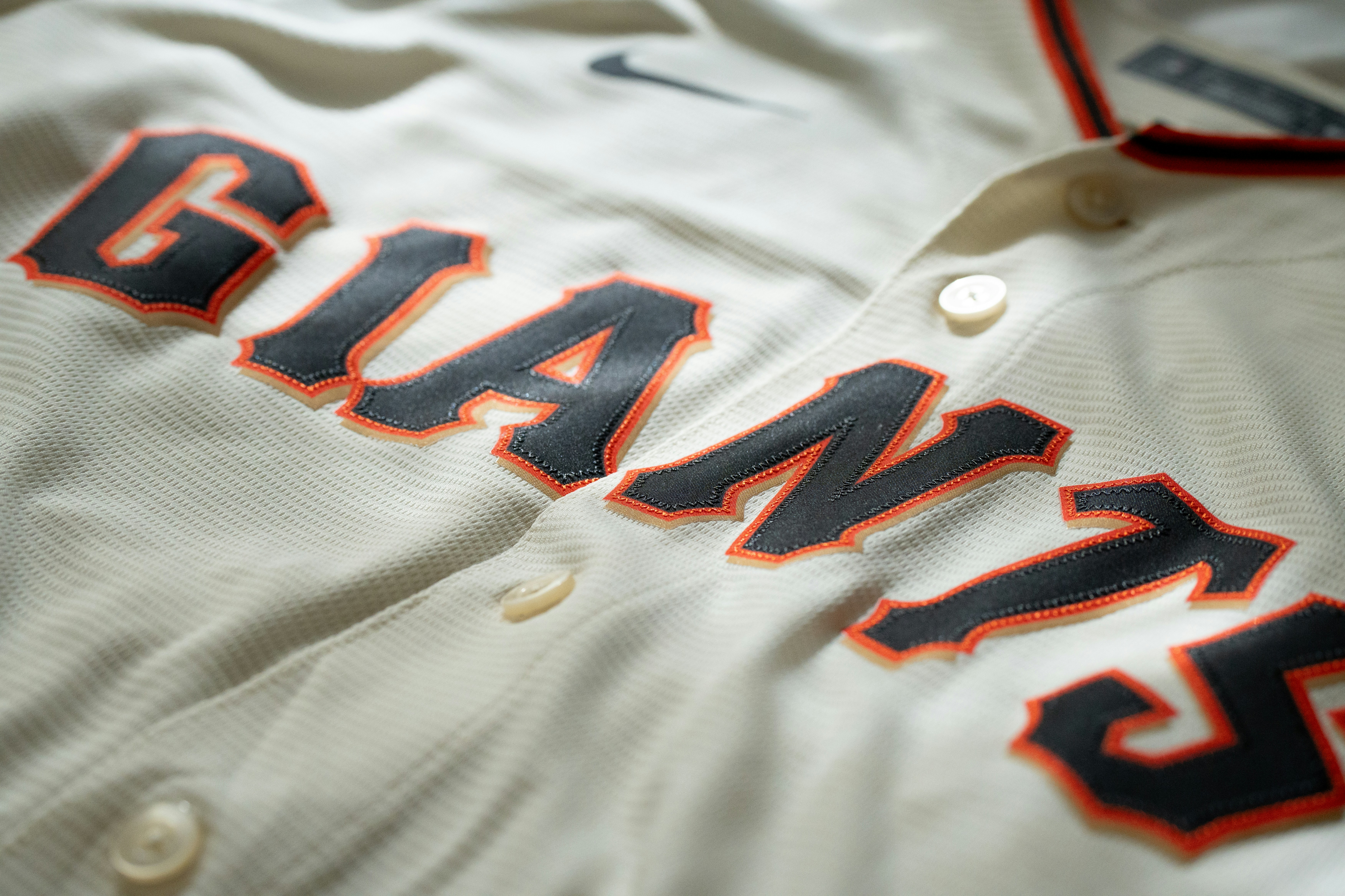 A san francisco giants baseball jersey is shown.