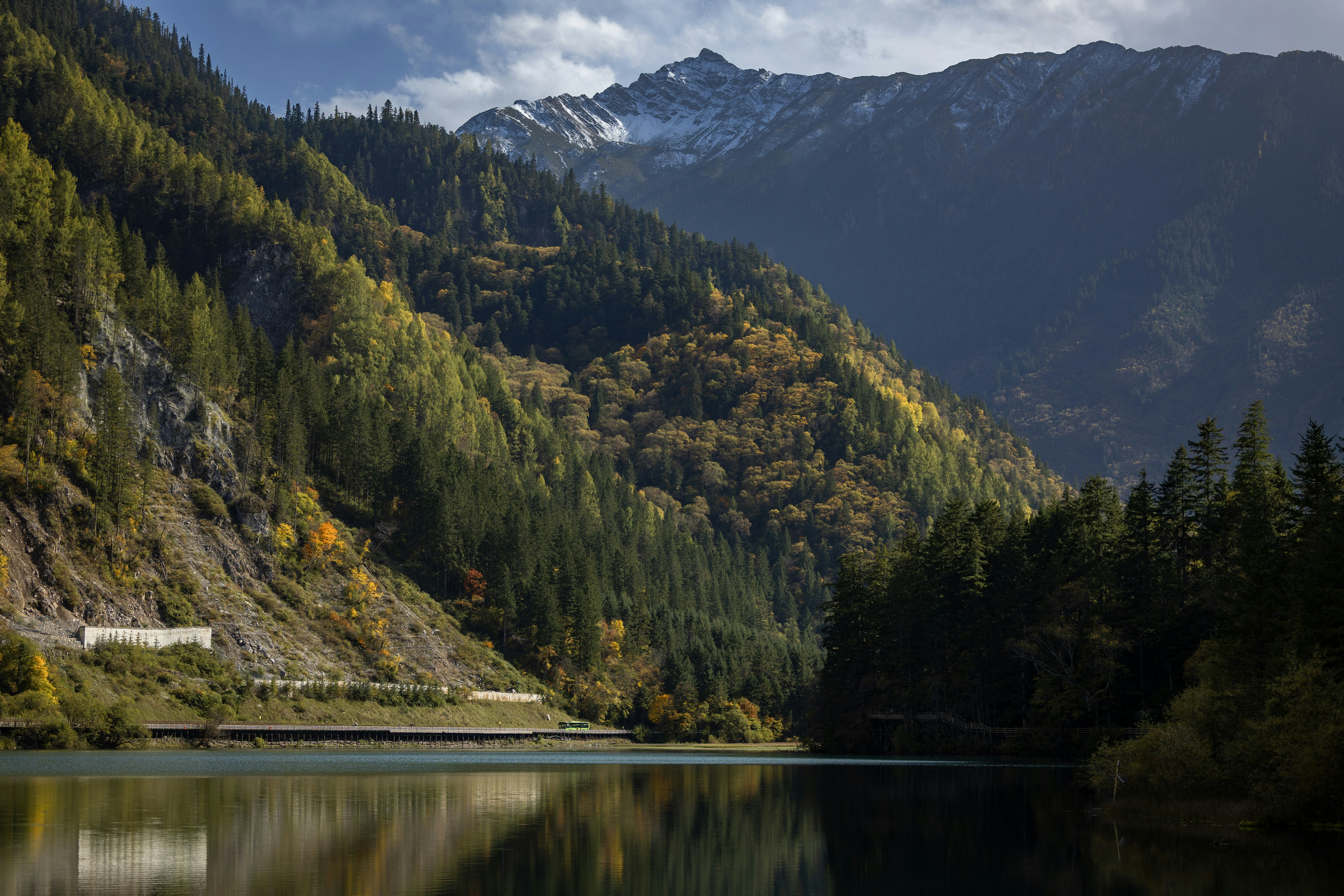 Mountains reflect beautifully in the calm lake.
