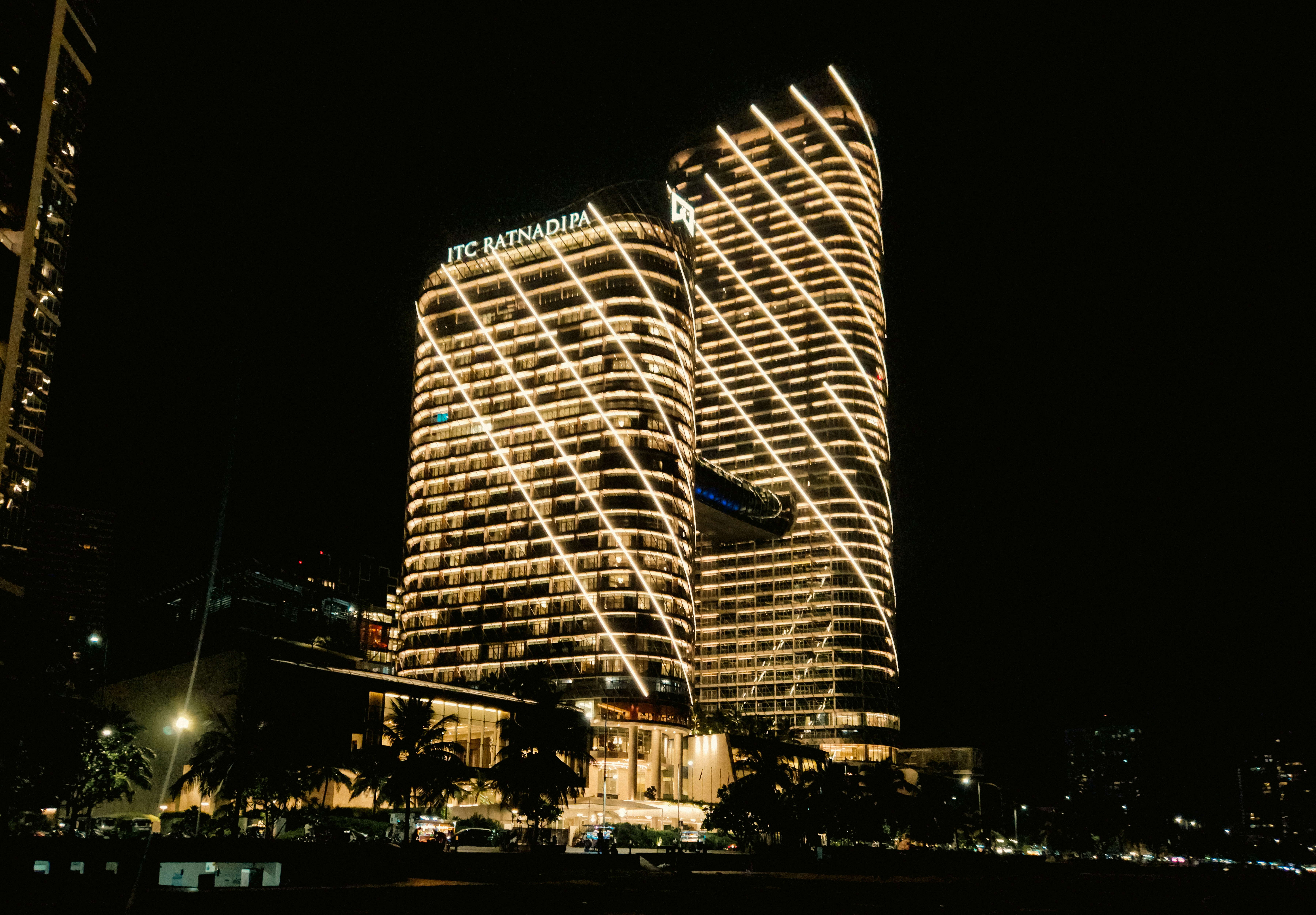 Luxury hotel at night showcasing modern architecture