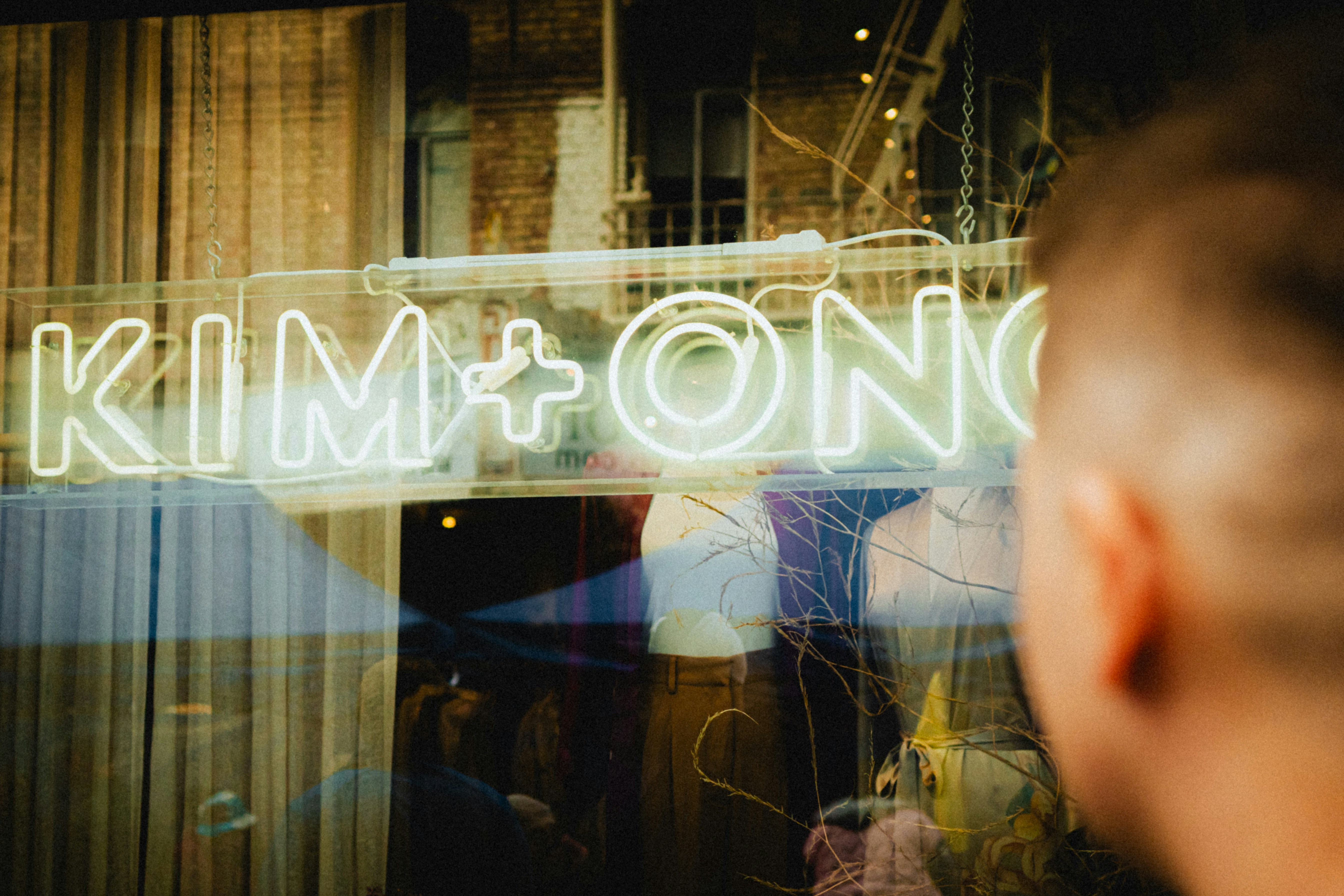 Neon sign for "kim + ono" brand.