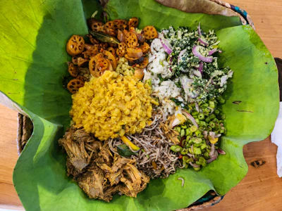 A Sri Lankan meal of rice and curries presented on a banana leaf