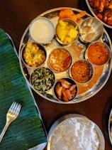 Delicious indian meal served on a platter.