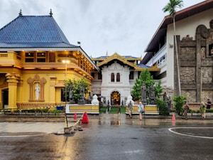 Buddhist temple in sri lanka with golden buildings.