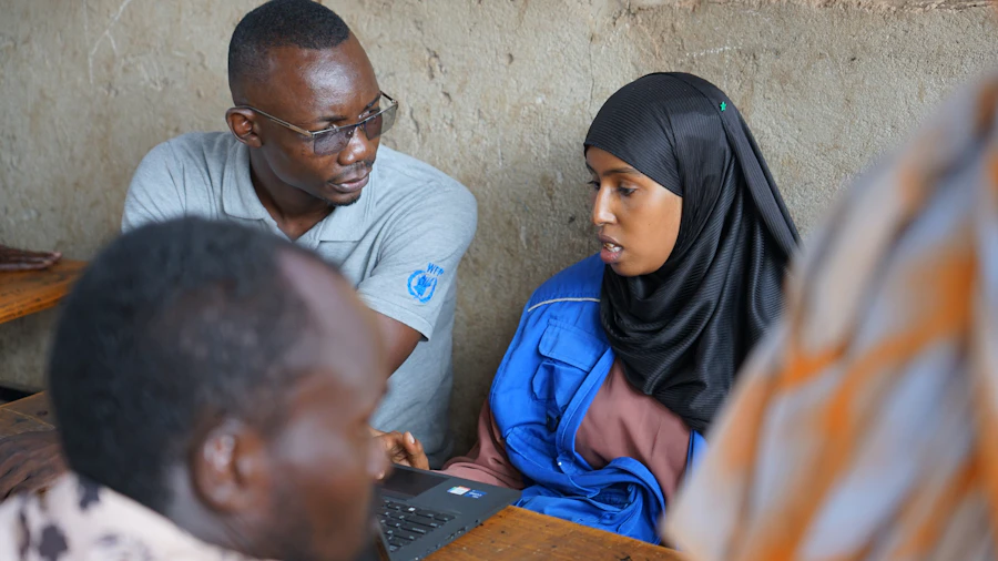 Bridge Star Foundation staff in discussion with local community leaders