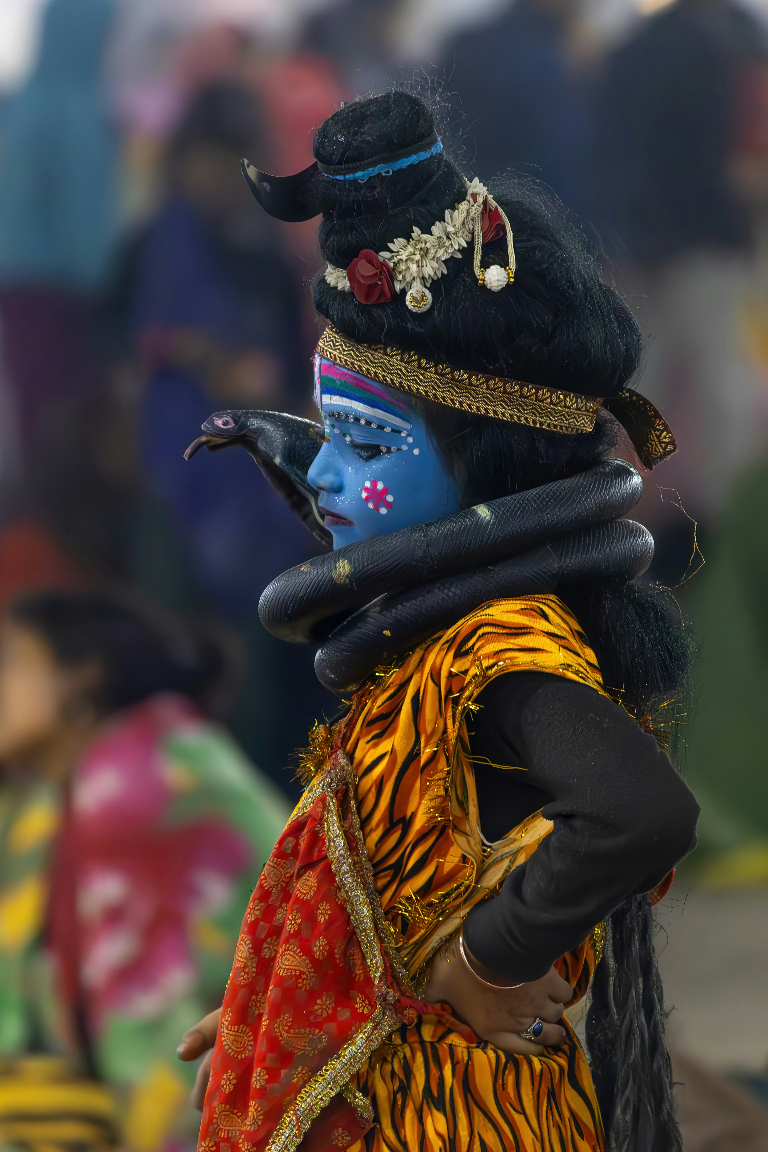 A child dressed as the hindu god shiva.