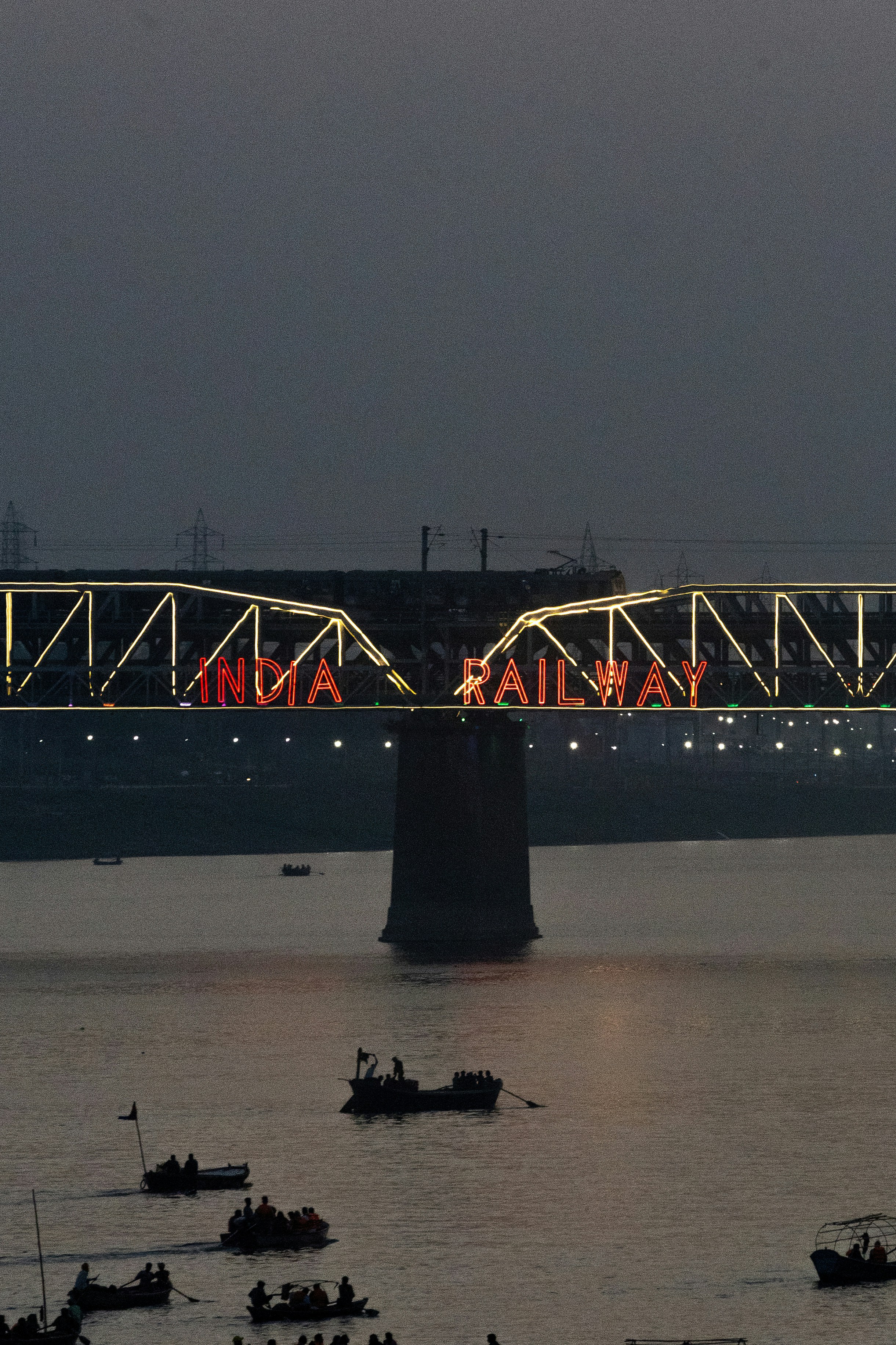 India railway bridge illuminated at night