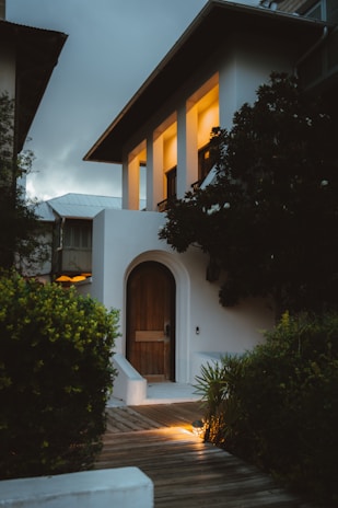 A cozy house with a lit interior.