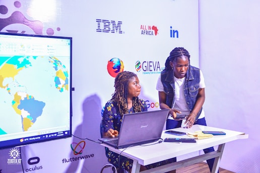 Two people are working on a project.