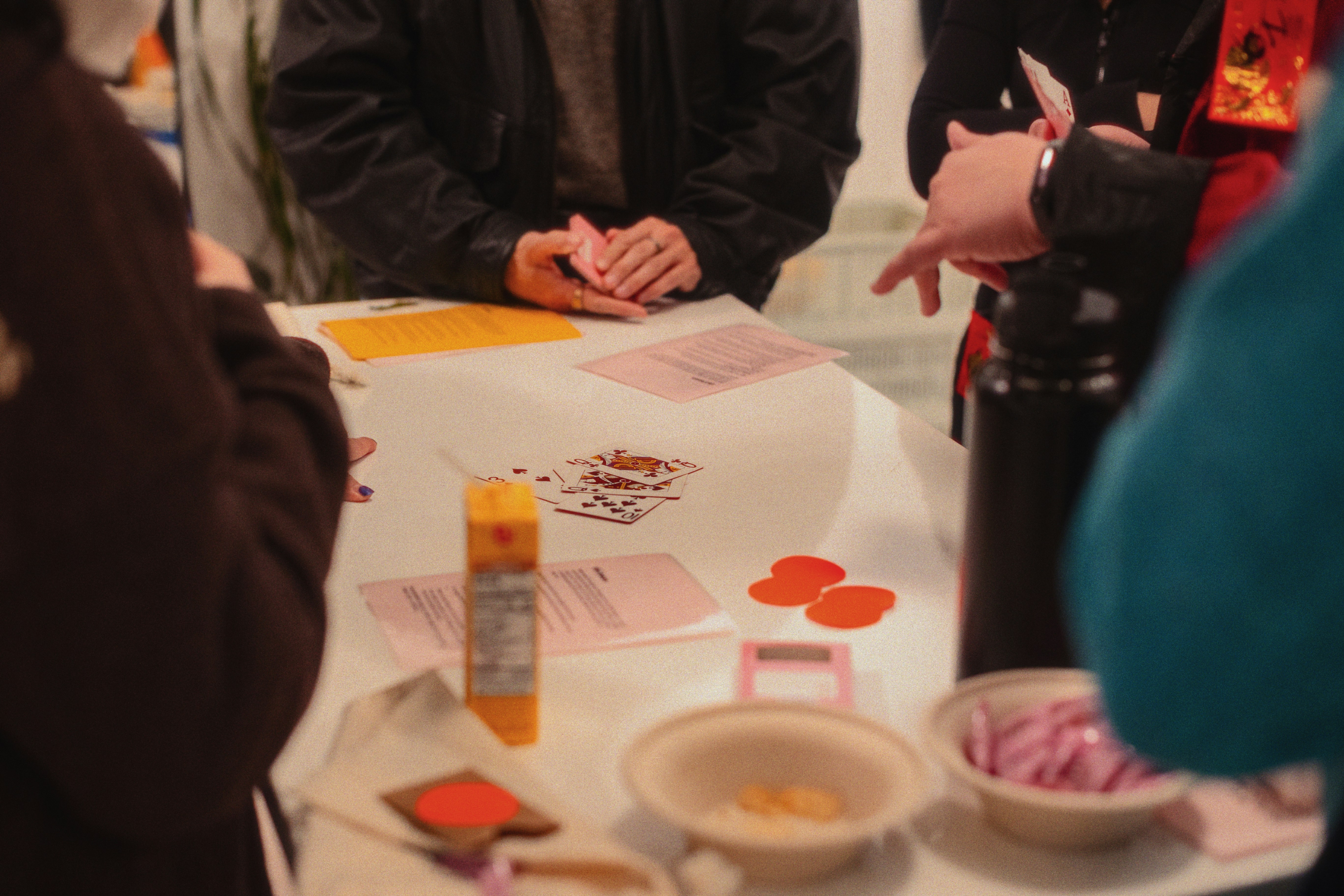 A diverse team collaborating around a table, brainstorming with colorful sticky notes.