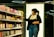 Woman shopping for items at a store.