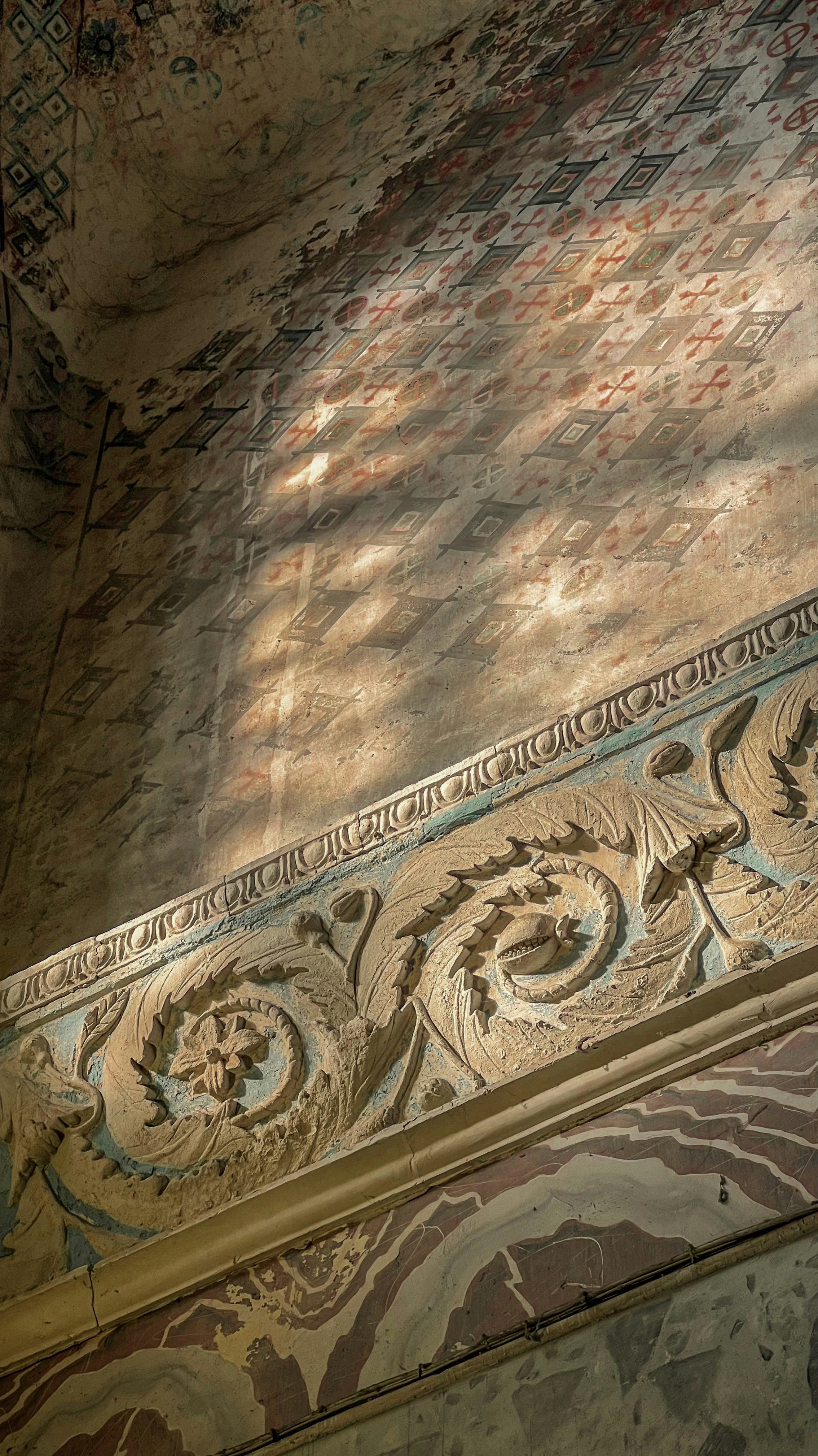 Ornate architecture with light shining through.