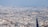 Aerial view of a sprawling cityscape.
