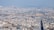 Aerial view of a sprawling cityscape.