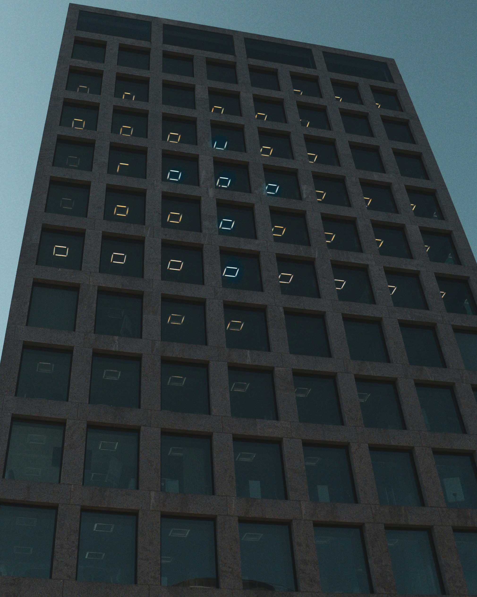 A tall building with numerous lit windows.