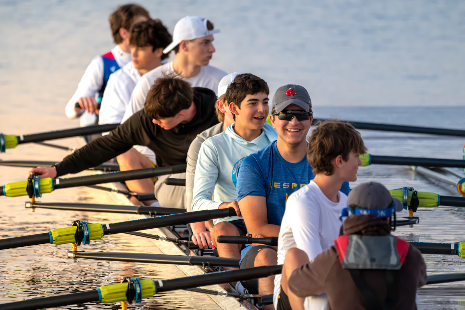 Two eights racing side by side on open water