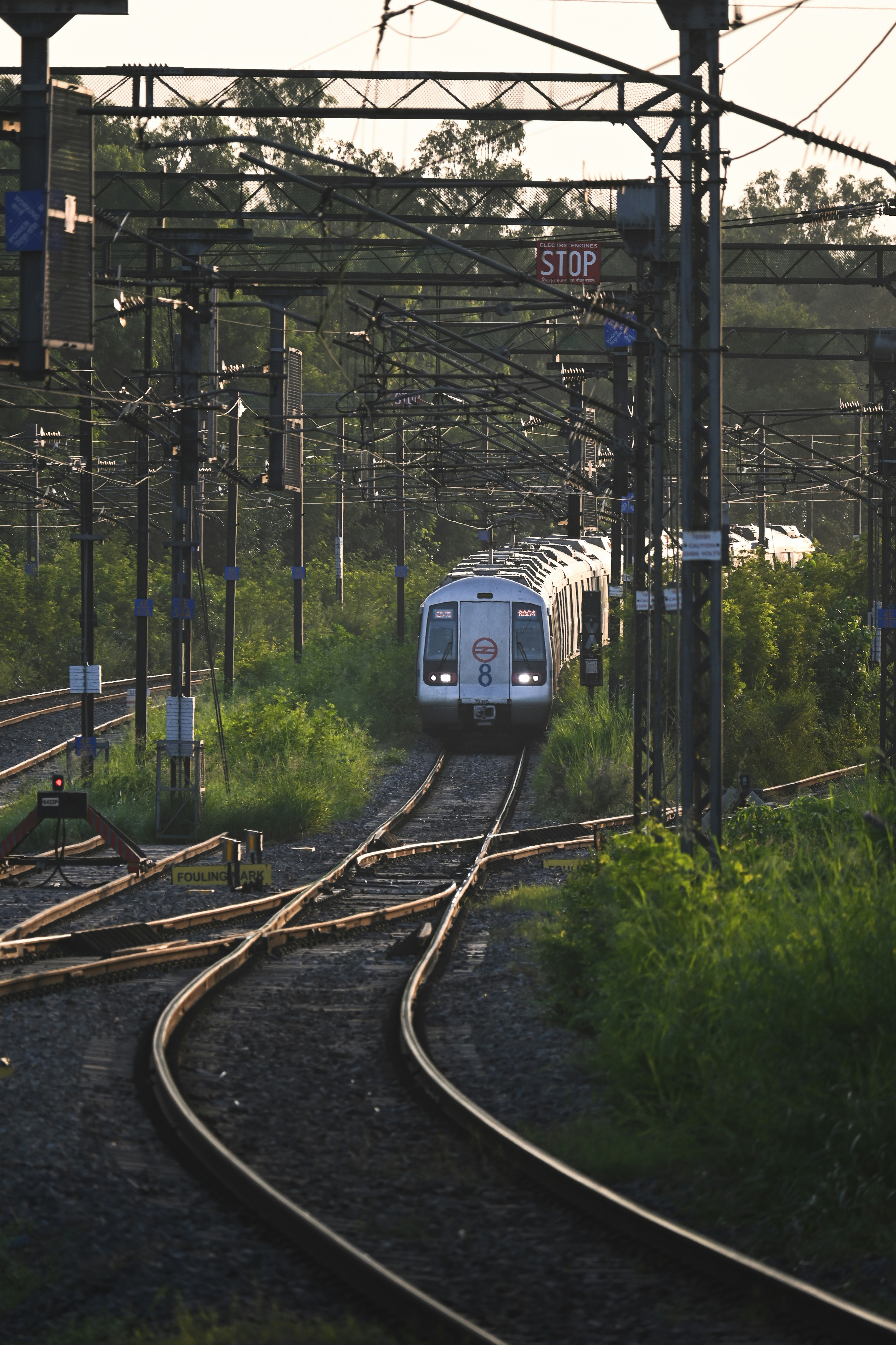 A train platform with an Arlanda Express train departing