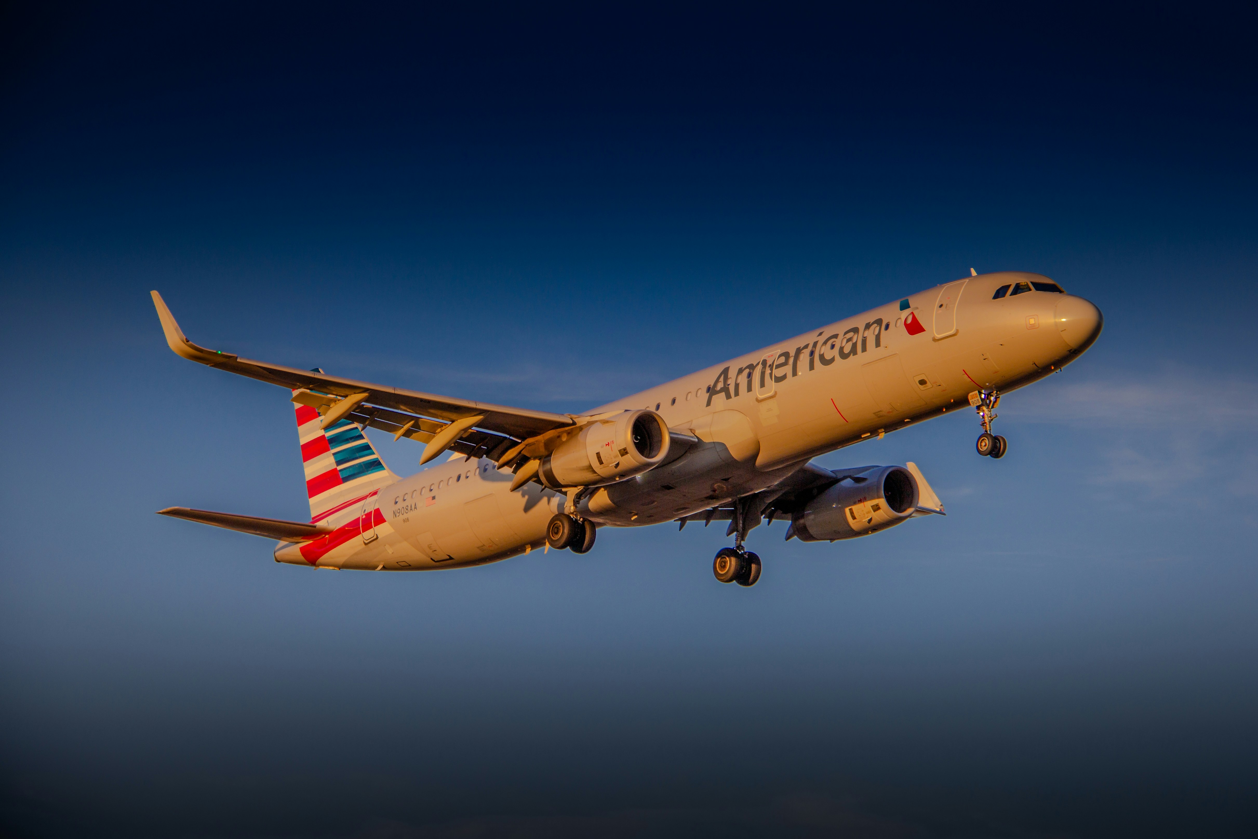 An american airlines plane takes flight.