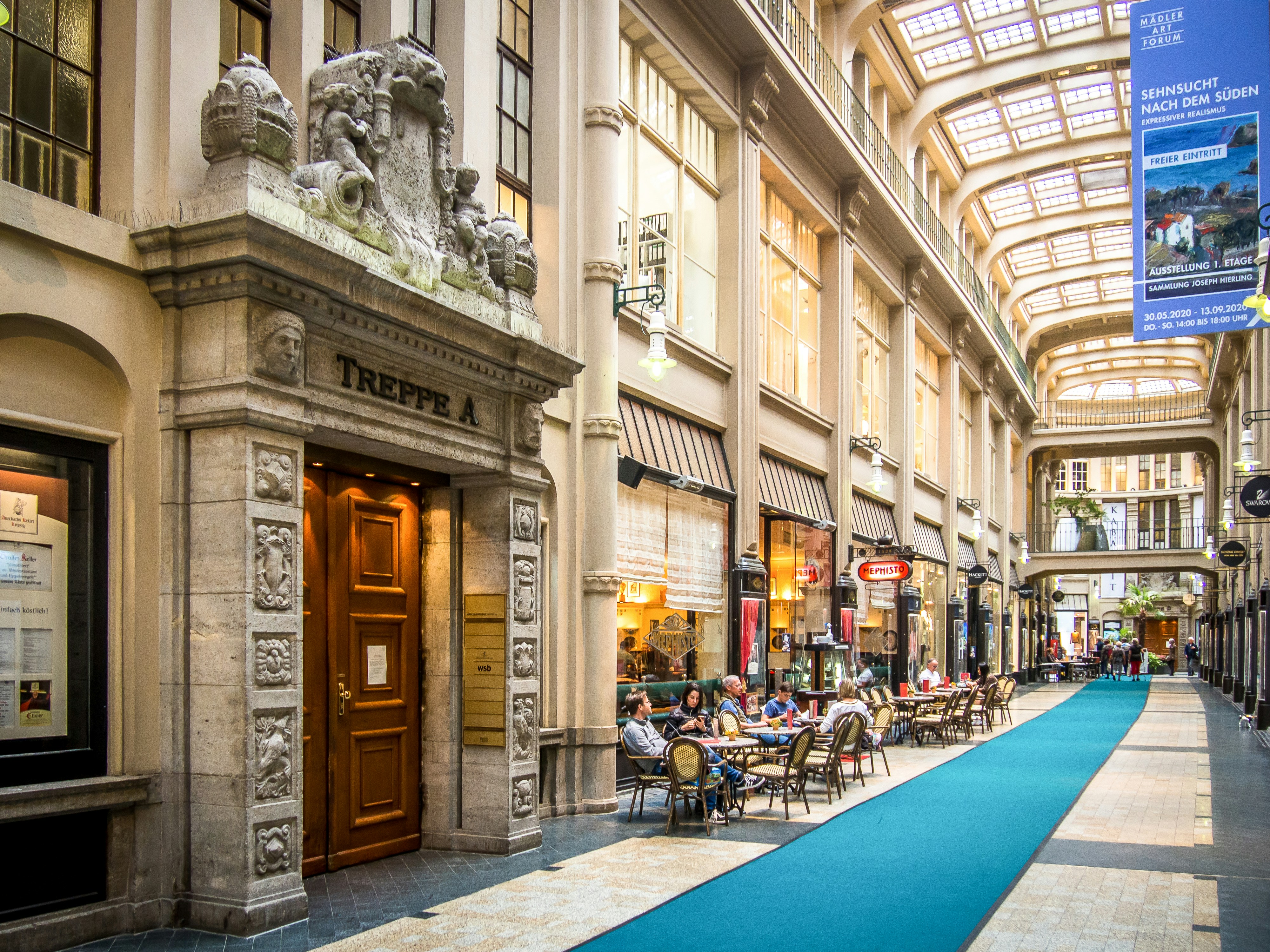 An elegant building with an interior arcade.