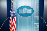 The white house press briefing room is empty.