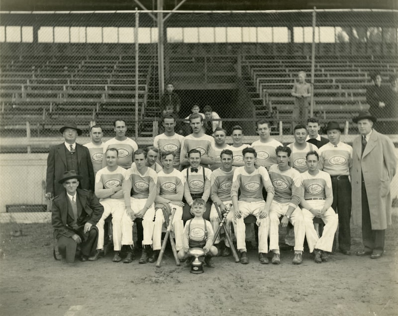 high school baseball, baseball stadium, players celebrating, championship trophy, scoreboard