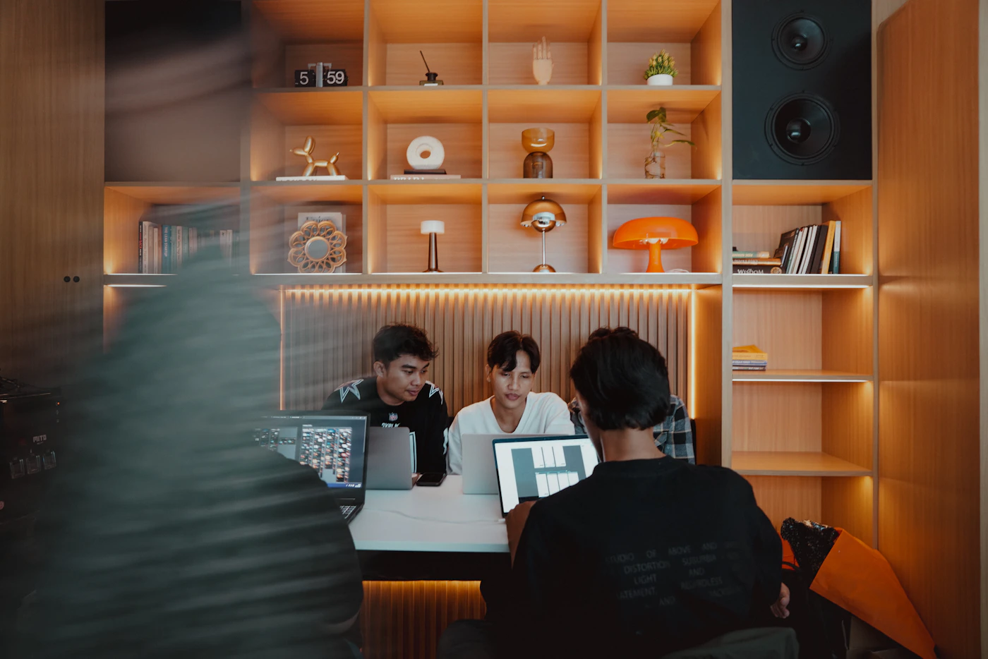 A creative team collaborating in the studio