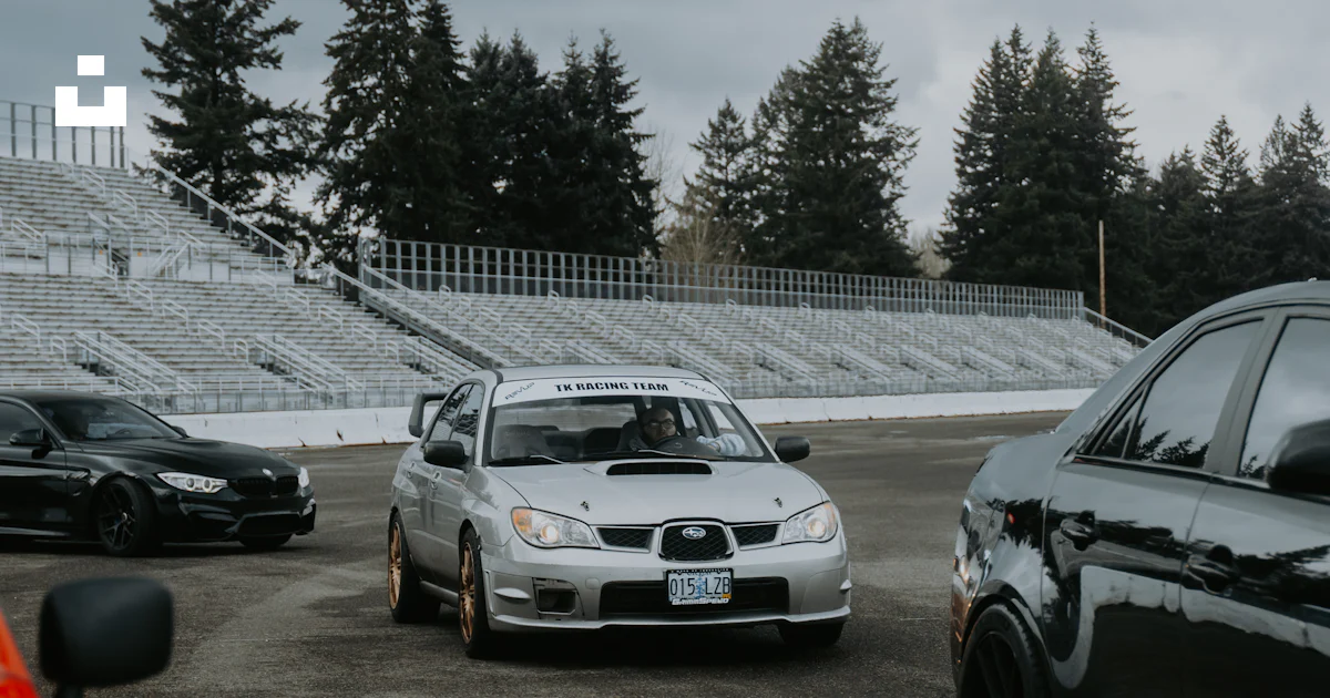 Car Racing Bleachers Cars on a racetrack with bleachers in background. photo – Free Car ...