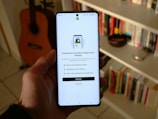 A phone shows a shopify app setup screen.