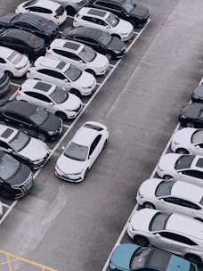 A parking lot filled with cars.